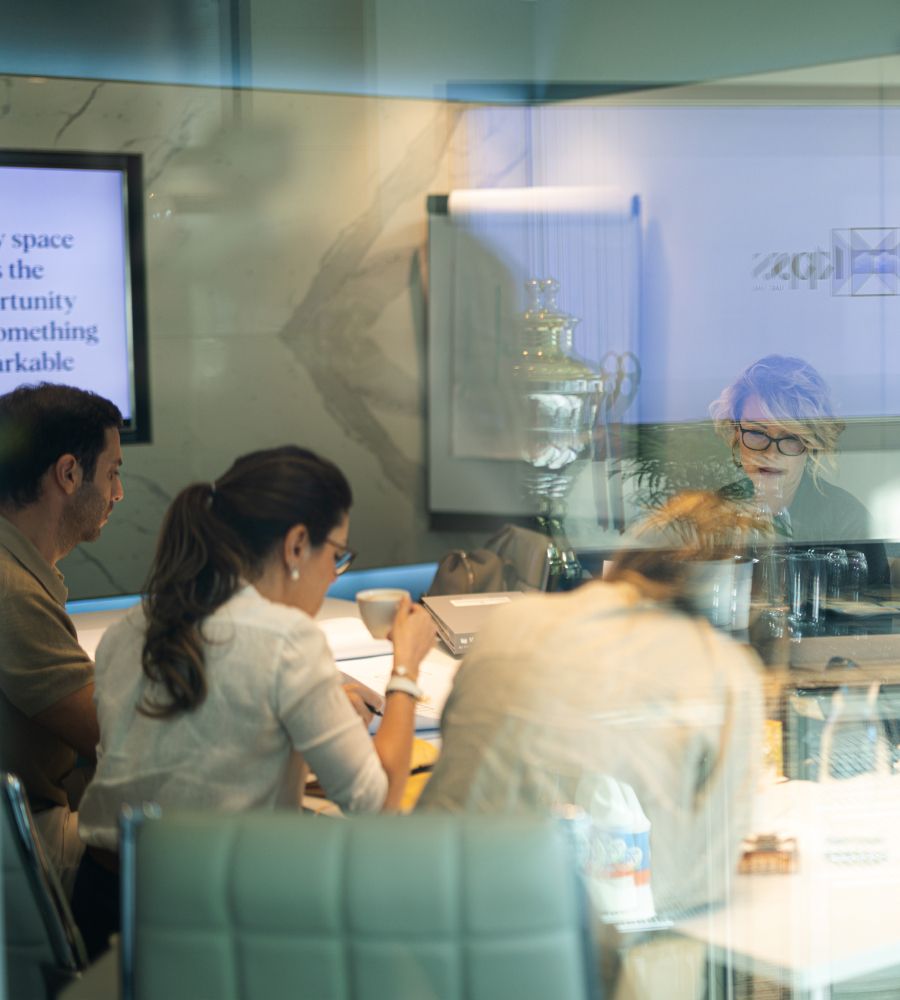 Commercial Interiors uae photo of a meeting through glass