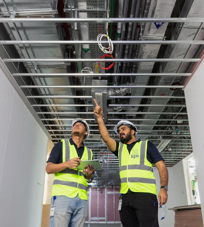 interior fit out contractors abu dhabi workers doing an inspection