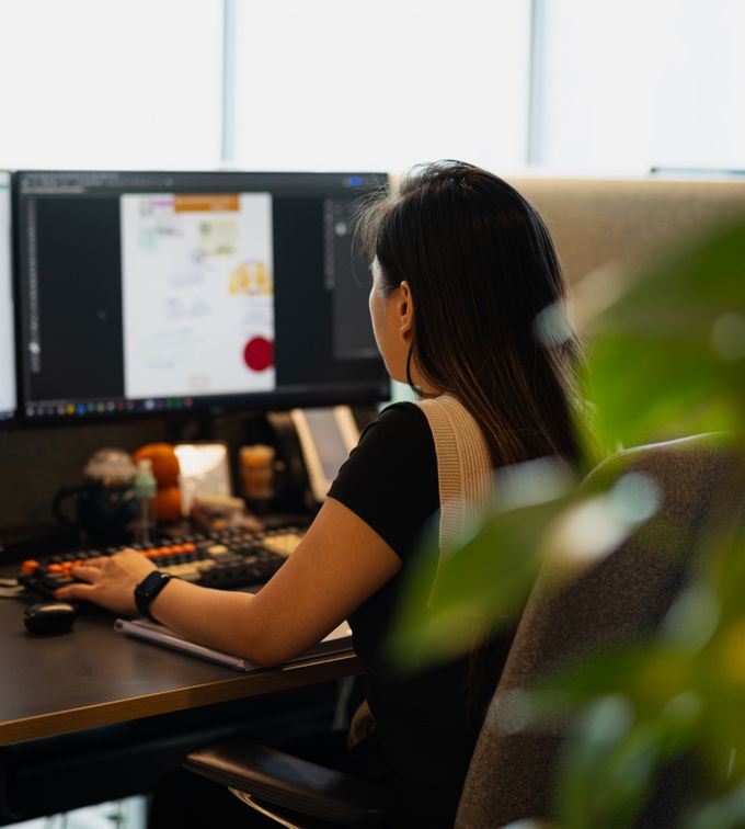 commercial interior fit out company person working at a computer