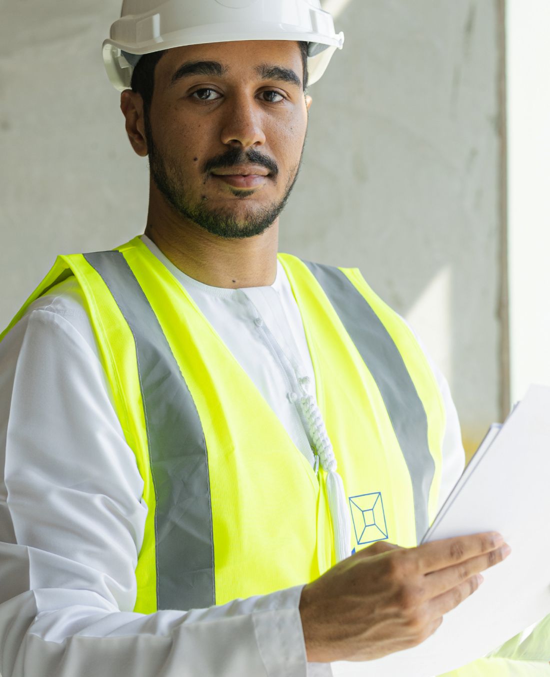 Commercial Interiors abu dhabi person wearing personal protection equipment