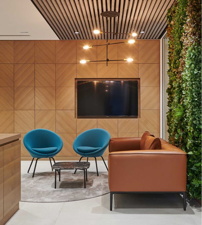 commercial interior fit out company abu dhabi interior photo of a warm coloured room with chairs
