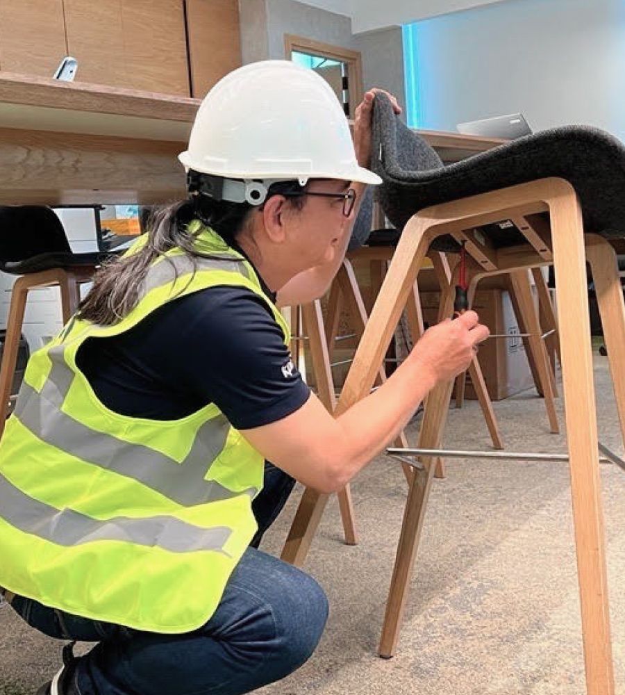 commercial fitouts in uae person constructing furnature